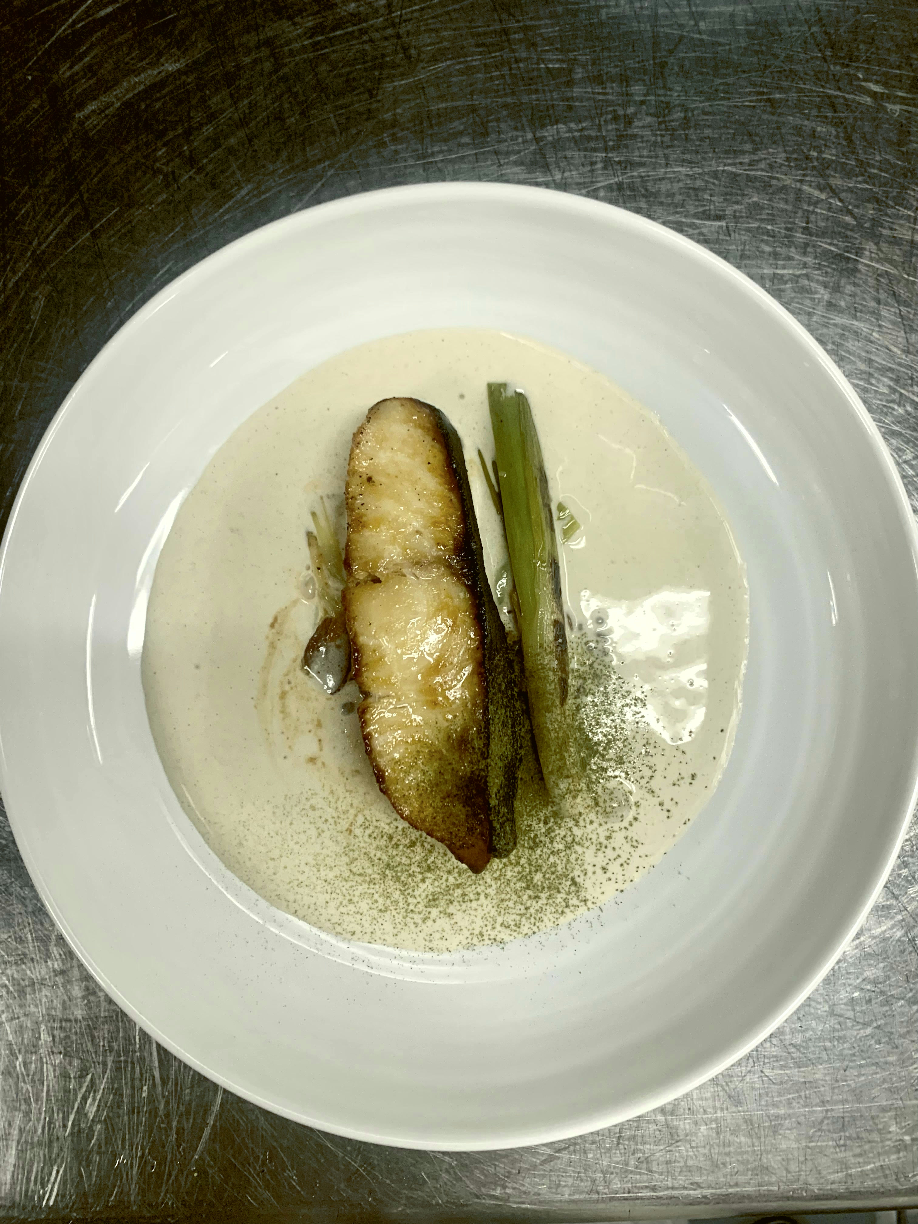 Miso-glazed fish, spring onion, dashi